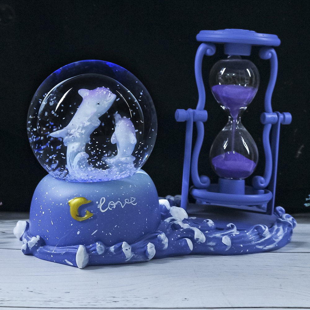 Dolfijn zandloper timer krista - Snow Globe Musical recensie en prijs